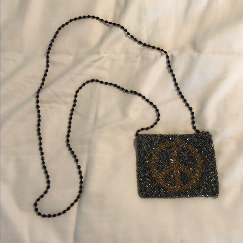 Sequence grey mini bag with peace sign detail